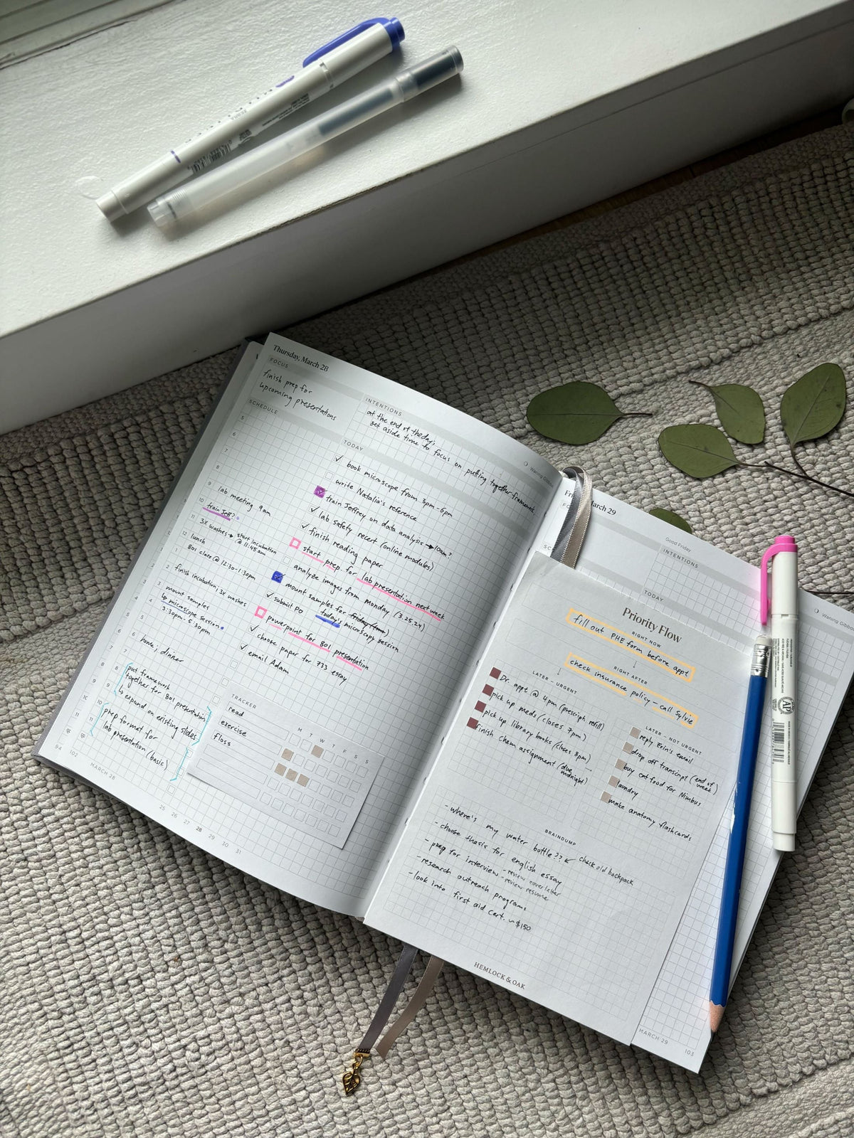 a student workspace with planner spread and time management tools