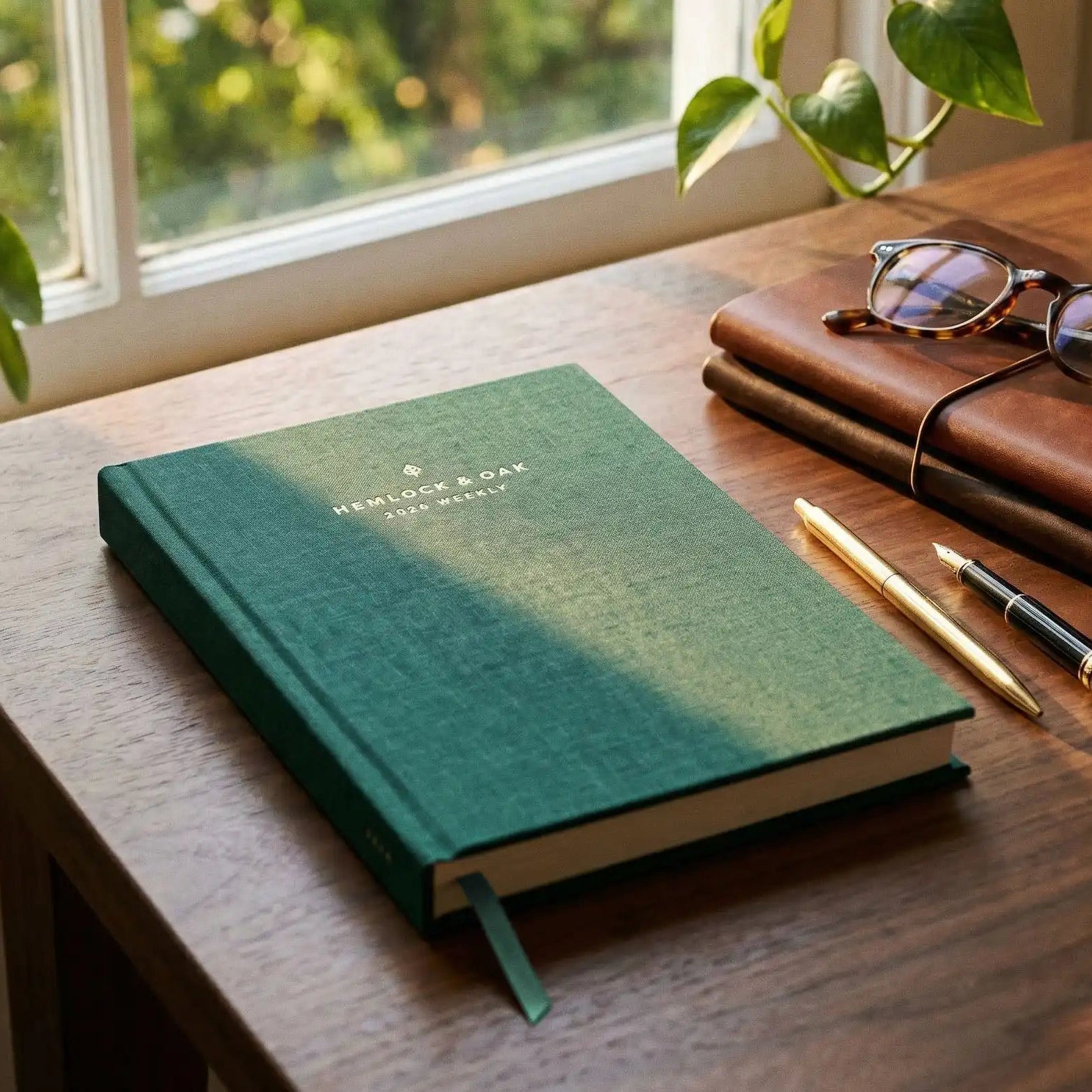 2026 Weekly Planner (Hardcover) in Enchanted Forest - lifestyle photo #color_Enchanted Forest