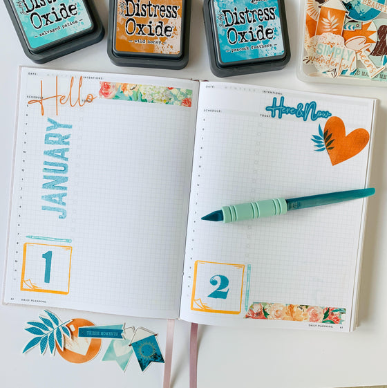 A customer's stamped and inked Daily planner page