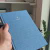 2027 B5 Minimalist Vertical Planner (Hardcover, Heritage 120gsm) in Spring, held in hand #color_spring