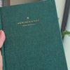 2027 Weekly Planner (Hardcover, Vertical, Heritage 120gsm, A5+) in Enchanted Forest, held in hand #color_enchanted forest
