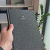 2027 B5 Minimalist Vertical Planner (Hardcover, Heritage 120gsm) in Witching Hour, held in hand #color_witching hour