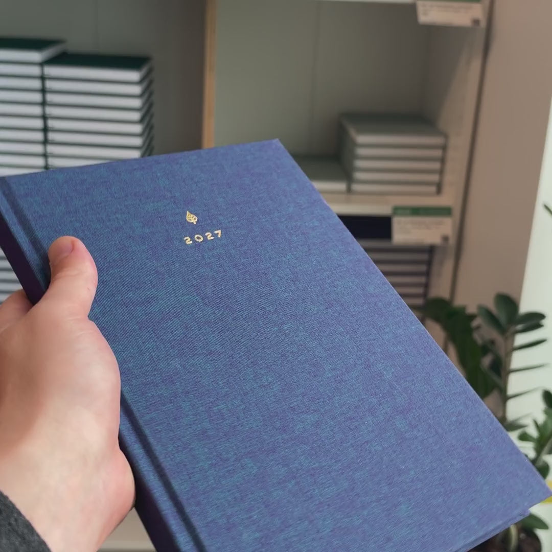 2027 B5 Minimalist Vertical Planner (Hardcover, Heritage 120gsm) in Wild Indigo, held in hand #color_wild indigo
